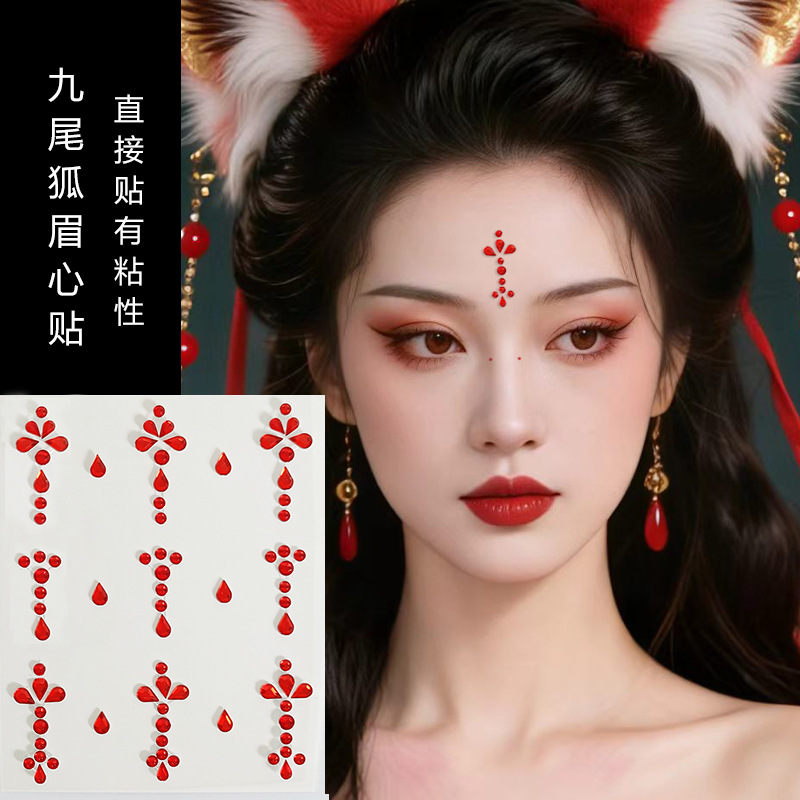 Parche de maquillaje de imitación de celebridades de Internet Parche de diamante Parche de diamante de mariposa Parche de diamante de imitación Parche de cara Parche de lágrima Parche de perlas de ojo Parche de diamante intermitente