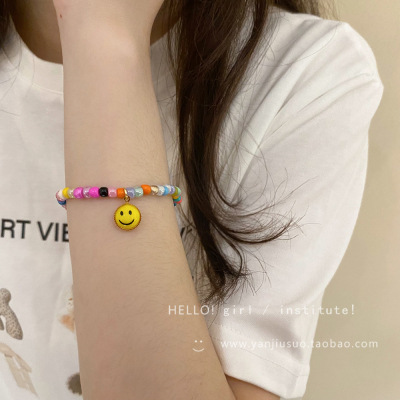 New year's new color beaded smiley sweatshirt necklace women's high-end design niche hot girl clavicle chain accessories