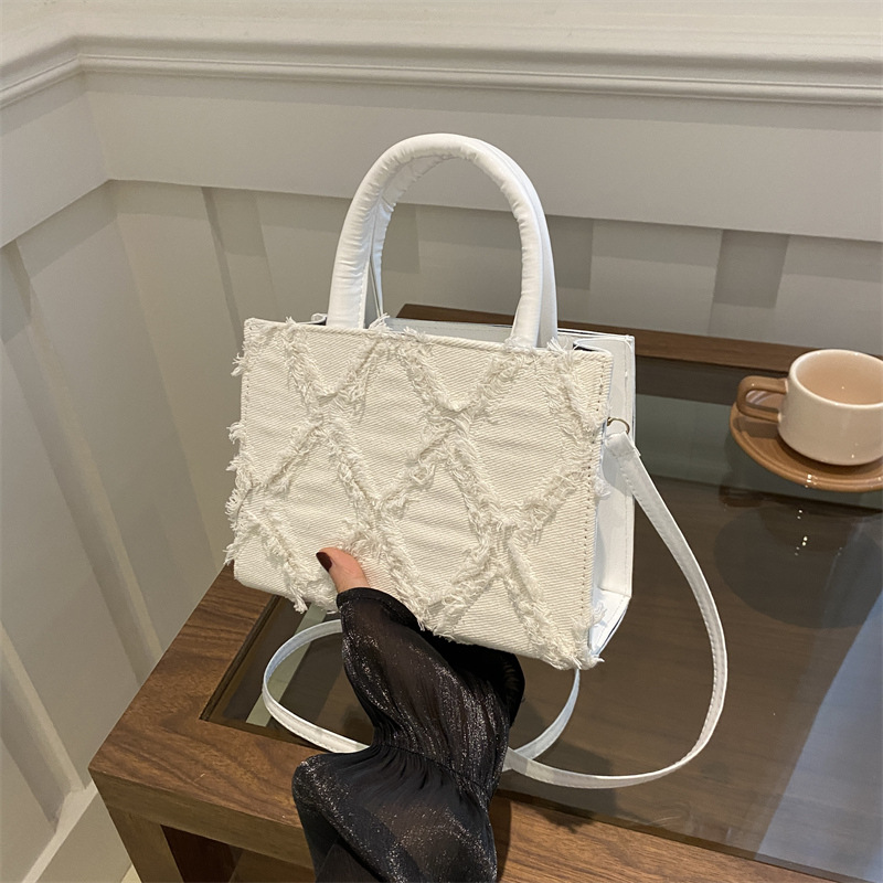 Bolso de moda de moda de Internet para mujeres 2024 nuevo estilo de moda de verano bolso de hombro portátil de mujer bolso de mochila jeans versátil