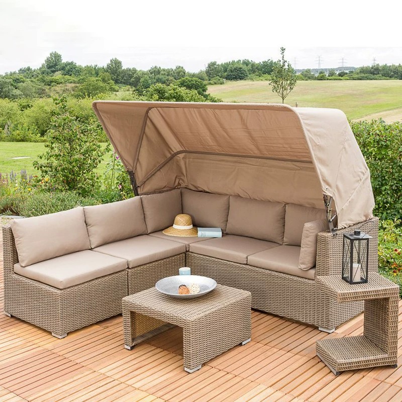 Outdoor rattan sofa with canopy, sunbed, and lounge chair set for garden, patio, and villa, providing outdoor shade and relaxation