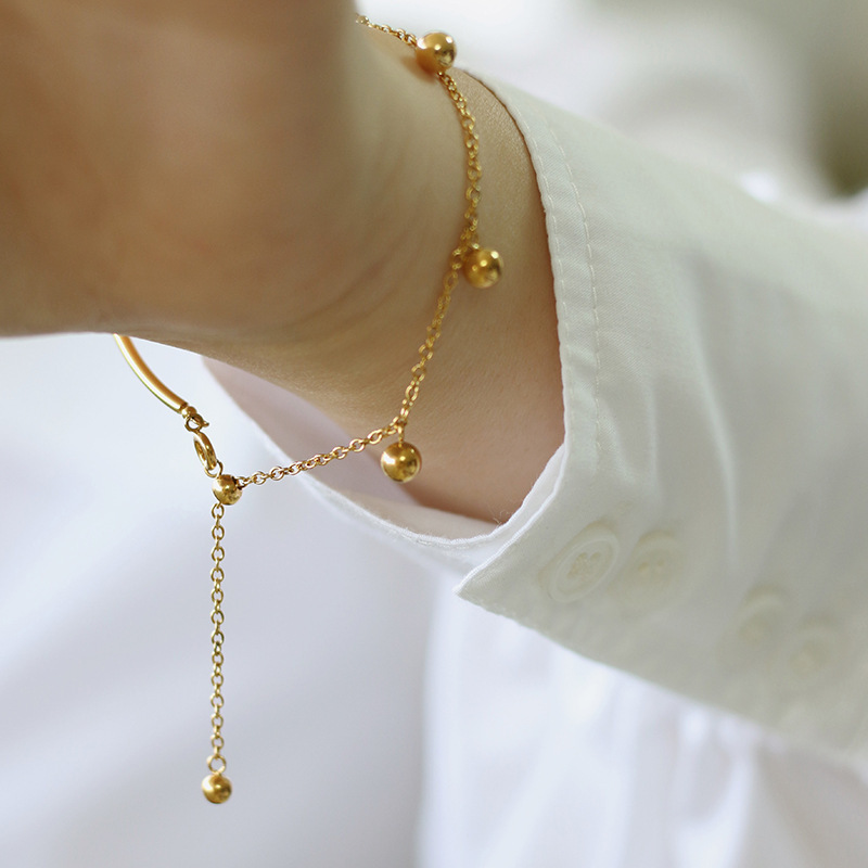 Europeo y americano ins joyería semi-Costura joyería hebilla redonda alambre bola de acero borla pulsera titanio acero chapado 18K oro joyería femenina