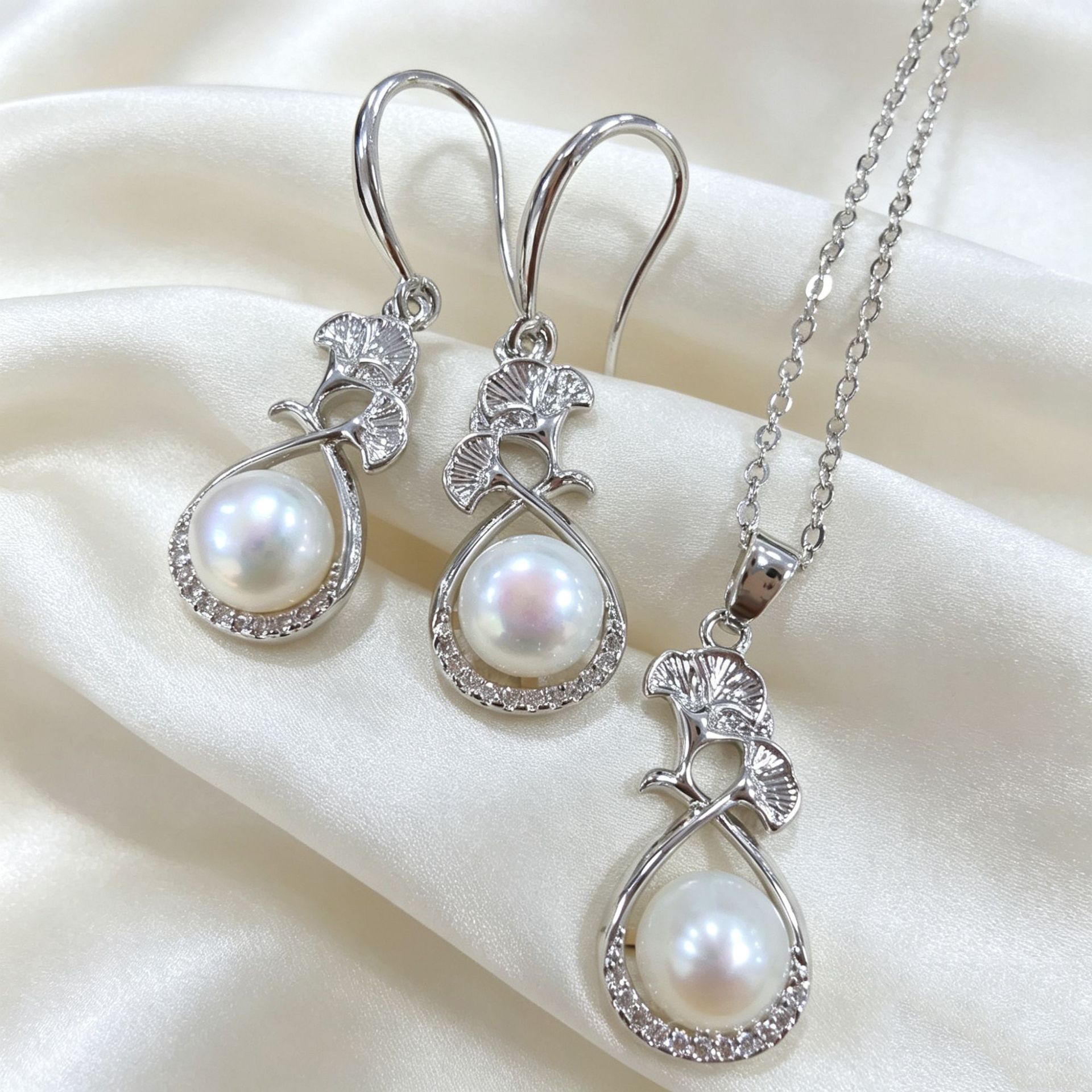Zhuji freshwater pearl earrings original design ginkgo leaf ear hook pendant necklace set light luxury high-end jewelry