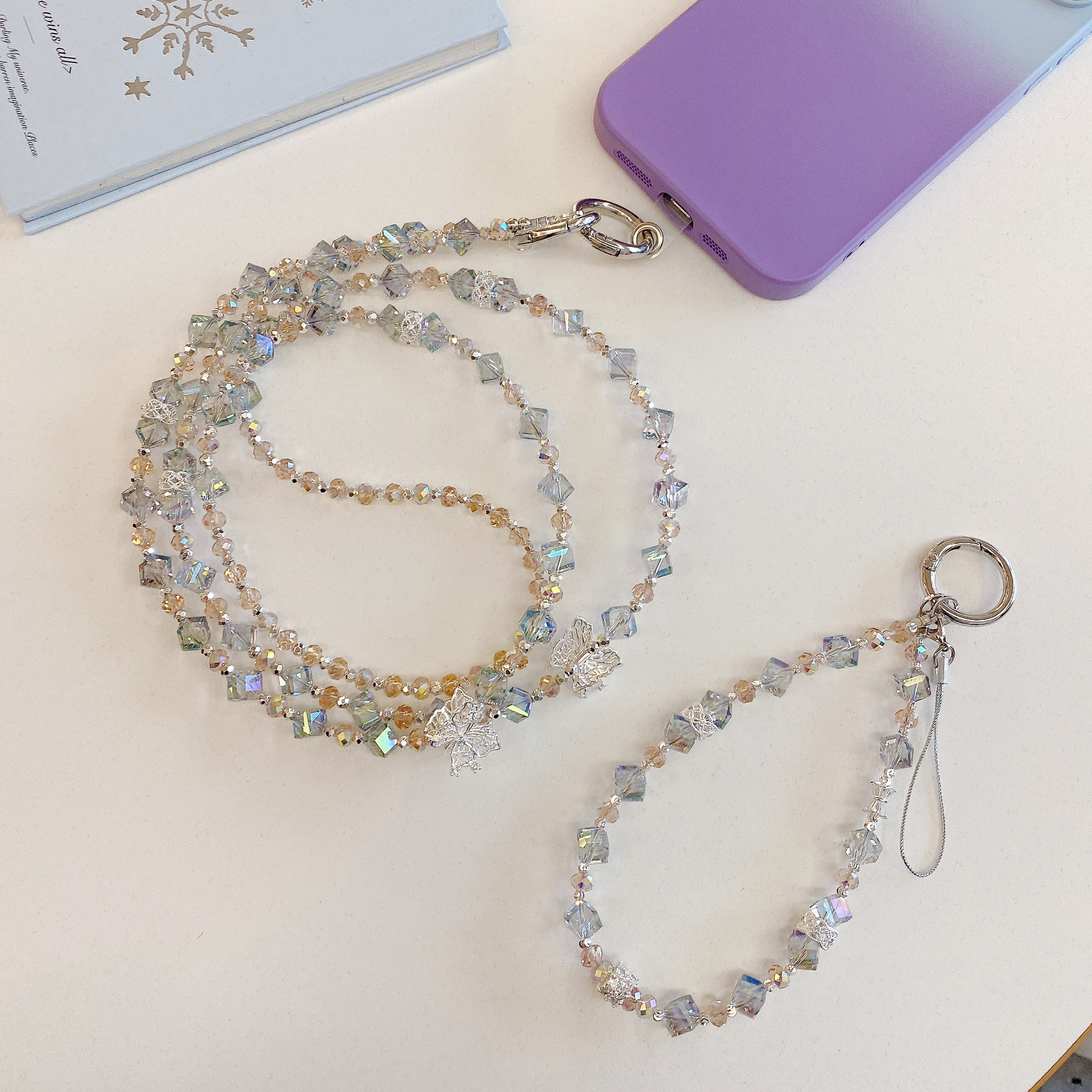 Boutique hecho a mano de alta gama para teléfono móvil cadena larga oblicua de viento ins cordón de teléfono móvil de moda colgante de mensajero largo