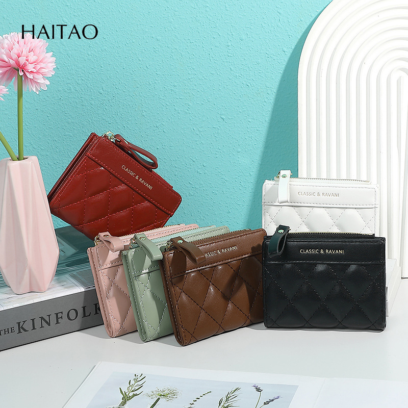 2025 primavera nueva Europa y los Estados Unidos nueva billetera en mujeres corta cremallera de diamante bordado moda alta 20% de descuento