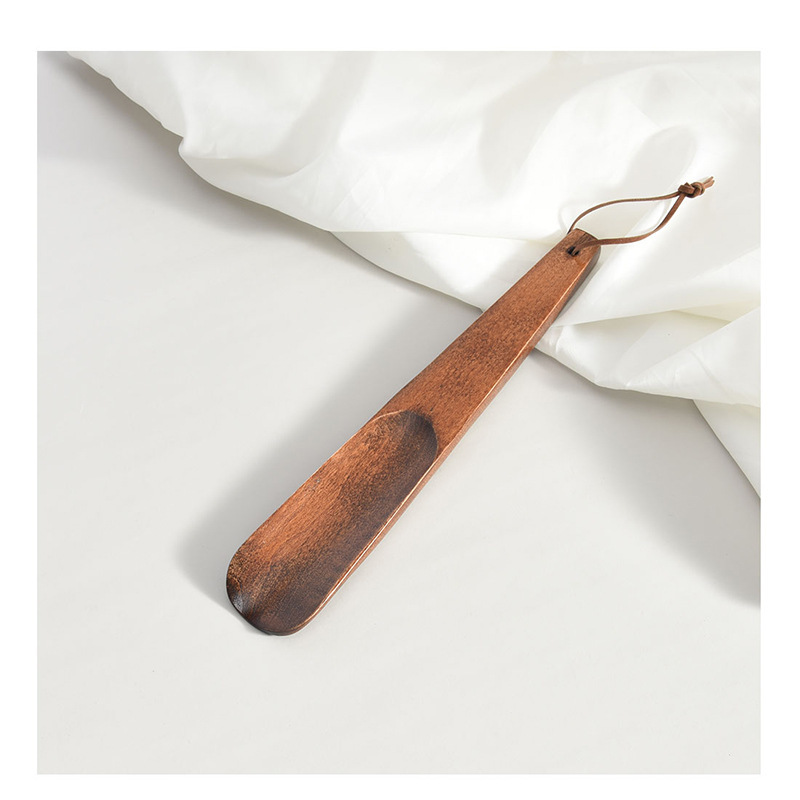 Solid wood shoehorn, short handle, home shoe pump, portable shoehorn, pregnant woman shoe wearer, wear shoes without bending, hotel wholesale