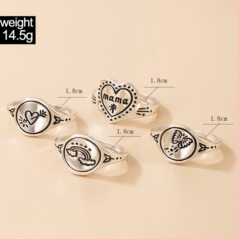 Fashion Hip-hop Jewelry Retro Letter Love Ring Four-piece Rainbow Butterfly Ring Set display picture 1