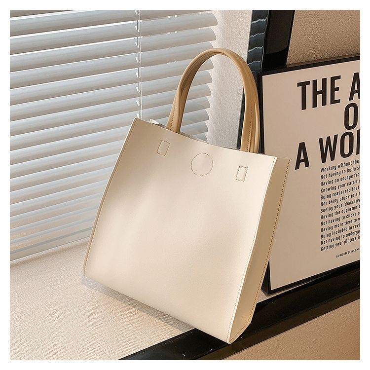2024 New Bags Korean Version Versatile Commuting Bags Large Capacity Portable Tote Bag Temperament Popular Women’s Bag Vertical Style_voghion.com