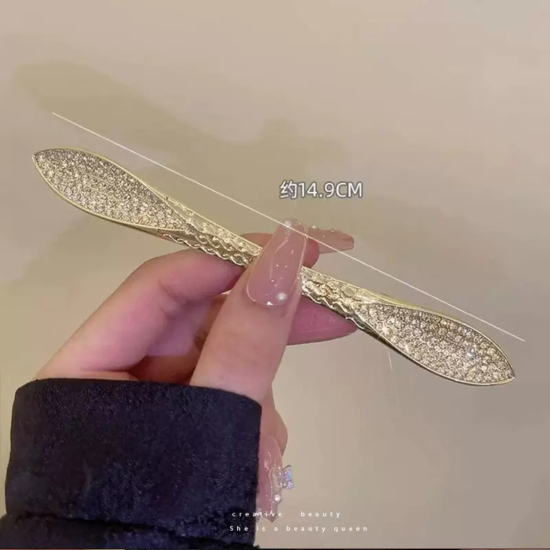 Horquilla de diamante de agua dorada