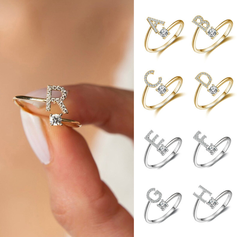 Europe and the United States 26 full diamond English letter opening ring zircon CNC diamond titanium steel vacuum plating does not fade