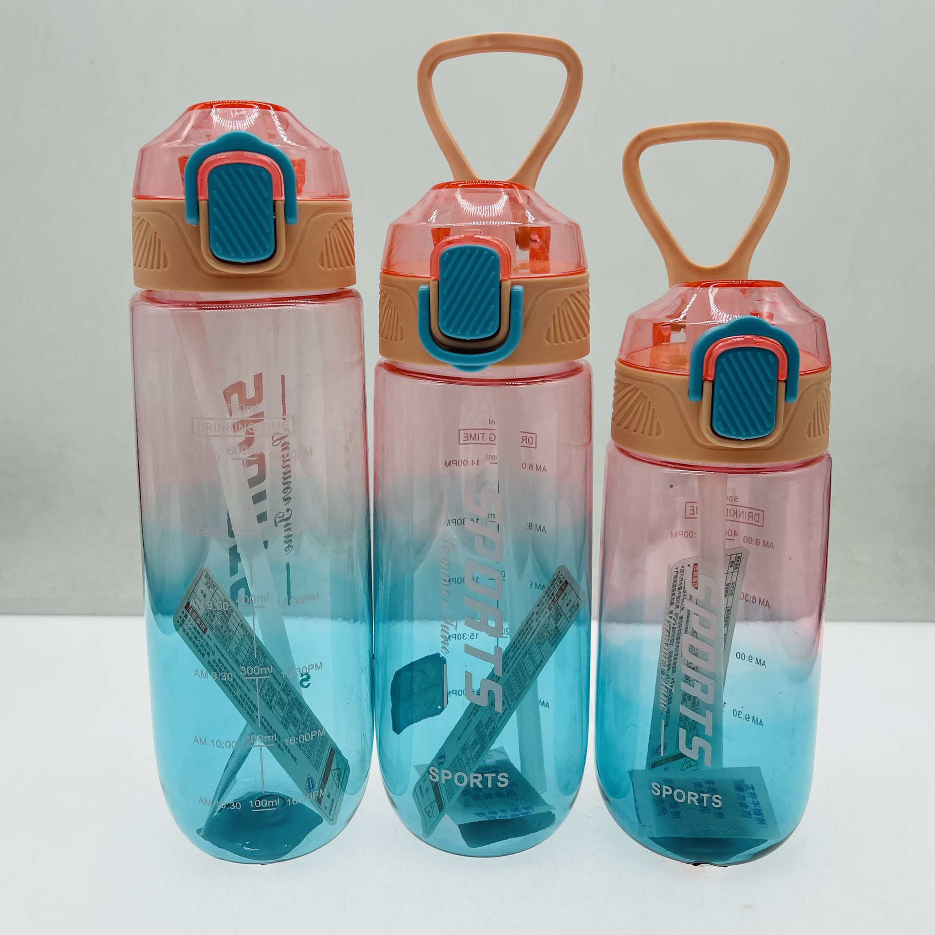 Baijia nuevo 5025 Comercio exterior gradiente de color espacio taza 750ml cubierta de rebote taza de deportes al aire libre portátil taza de agua