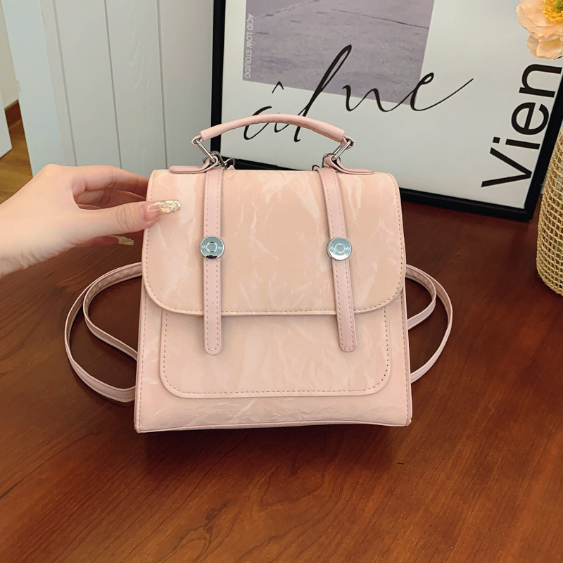 Mochila pequeña 2024 nuevo estilo de diseño de moda nicho de viaje bolsas escolares ligeras para mujeres ins para salir mochila pequeña