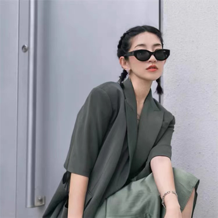 Nuevas gafas de sol retrógradas con ojos de gato femeninas coreanas de alto nivel con la misma tendencia callejera anti-UV gafas de sol para hombres