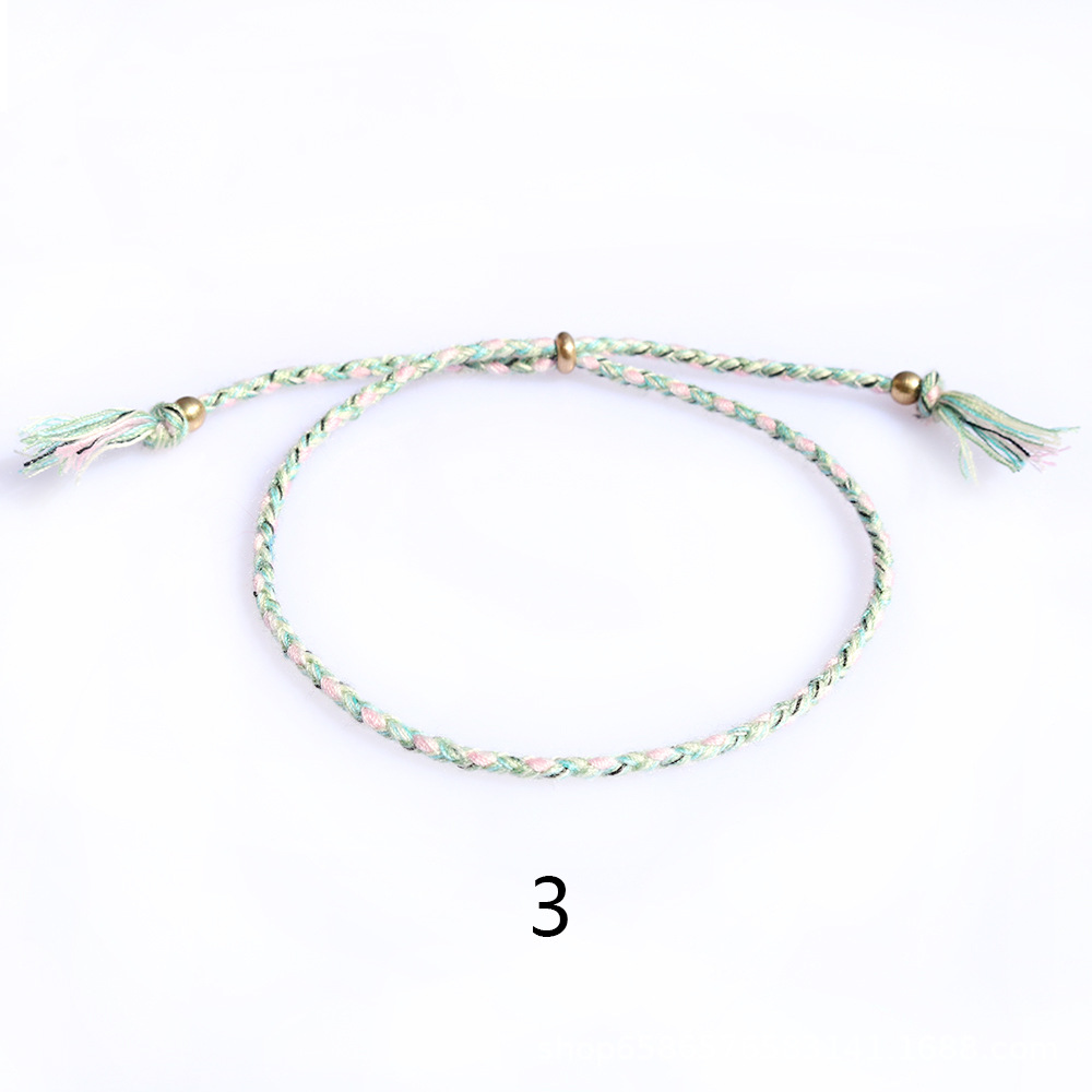 Amazon popular colorido cuerda de algodón amistad pulsera perlas de cobre borla pulsera tejida a mano ajustable hombres y mujeres pulsera