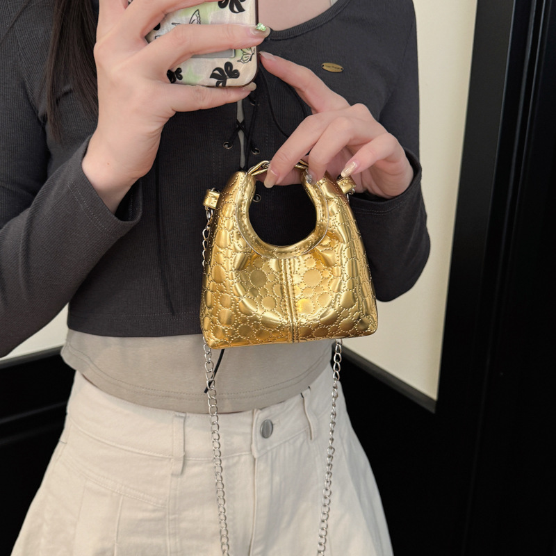 Paquete compacto mini bolso de hombro para niños y niñas coreanos simple bolso de bebé de color sólido 2026 nuevo bolso de cambio para niños