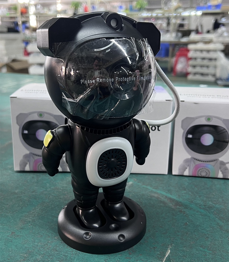 Nueva luz de proyección de cielo estrellado Bluetooth transfronteriza, colorida atmósfera de astronauta de carreras de caballos, luz nocturna, adornos de astronauta RGB