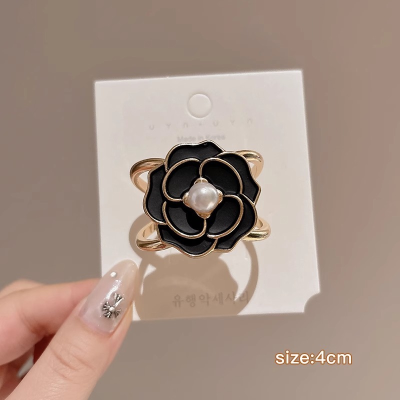 Botón de toalla de seda de alta calidad para mujer de alta gama 2025 nuevo estilo arco esquina anudada camisa de flores serpentina anudada hebilla anudada