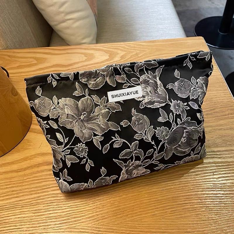 Bolsa de cosméticos de gran capacidad portátil fresco pequeño floral ins bolsa de almacenamiento bolsa de lavado elegante bolsa de almacenamiento jacquard