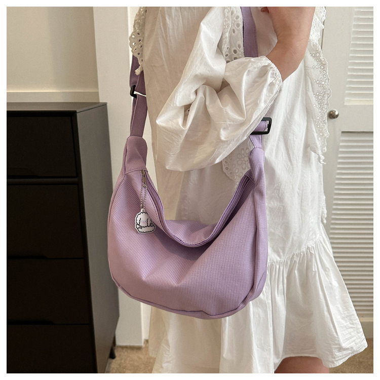 Large capacity canvas shoulder for women in spring summer 2023, new solid color, simple and fashionable casual bag,_voghion.com