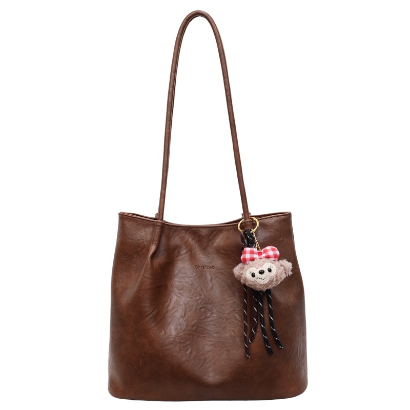 Bolsas de cubo de moda retro transfronterizas mujeres otoño / invierno 2025, nuevas bolsas de moda, bolsas de brazo, bolsas de hombro de viaje coreanas