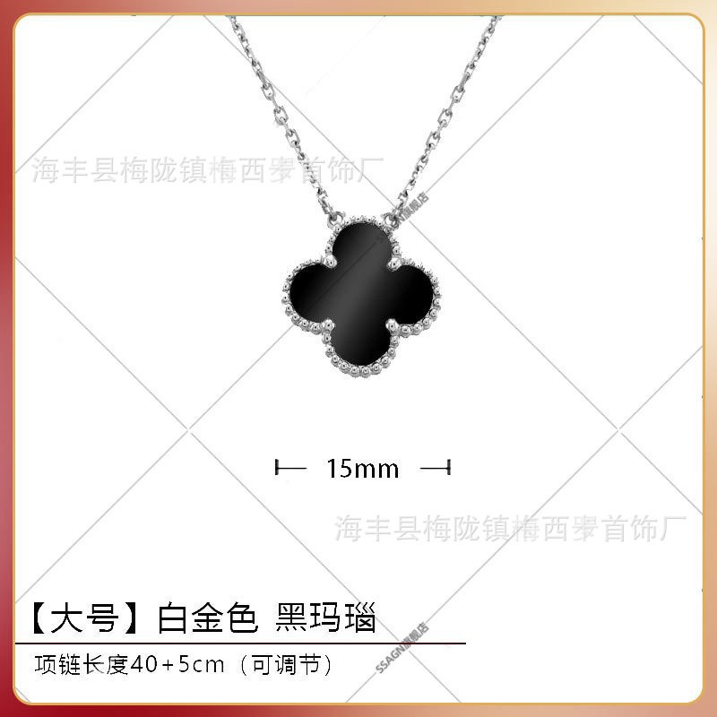 Large four-leaf clover necklace white gold black onyx