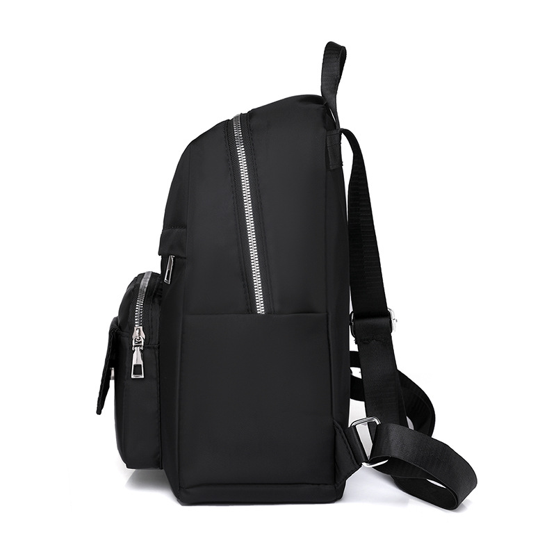 Mochila de nailon de gran capacidad para mujer 2024 nueva mochila casual al aire libre mochila de viaje ligera al por mayor