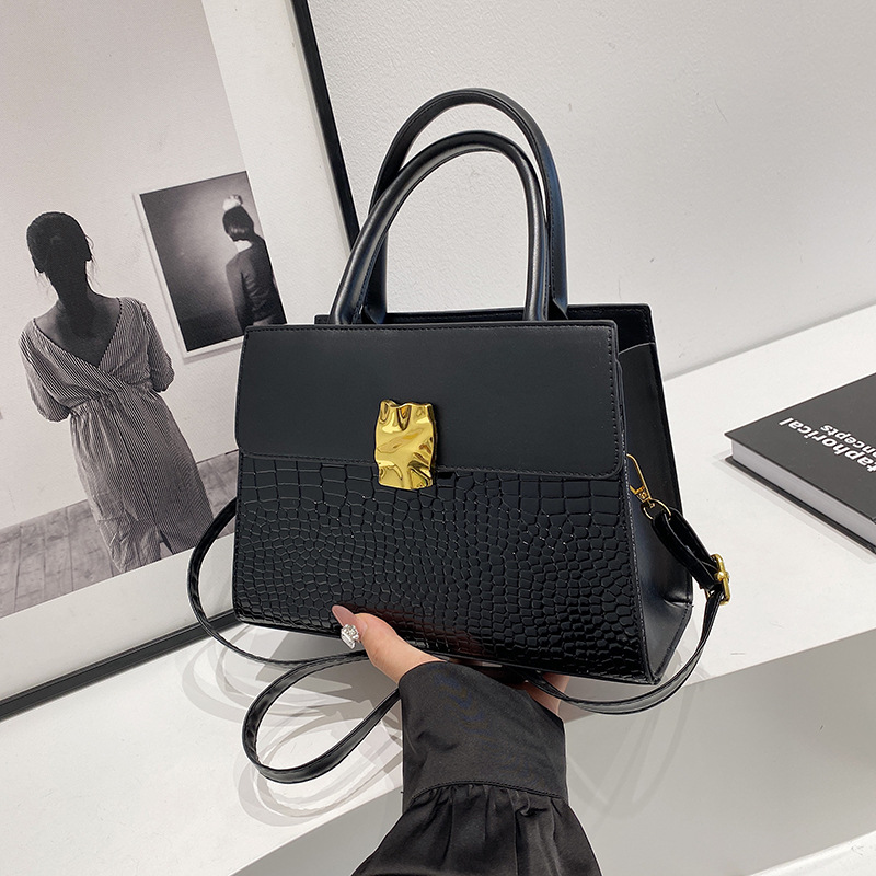 Bolso de mano con patrón de cocodrilo de alta gama de moda coreana para mujer 2024 otoño nuevo diseño de nicho pequeño bolso cuadrado de cercanías