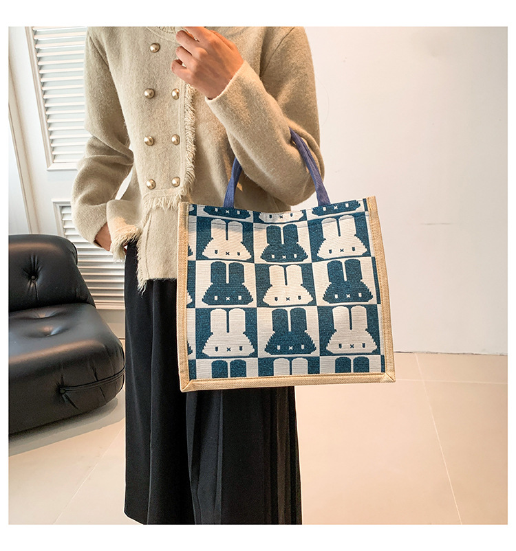 High-end mid-capacity canvas school commuting handbag 2024 new style fashionable and versatile linen single-shoulder tote bag undefined