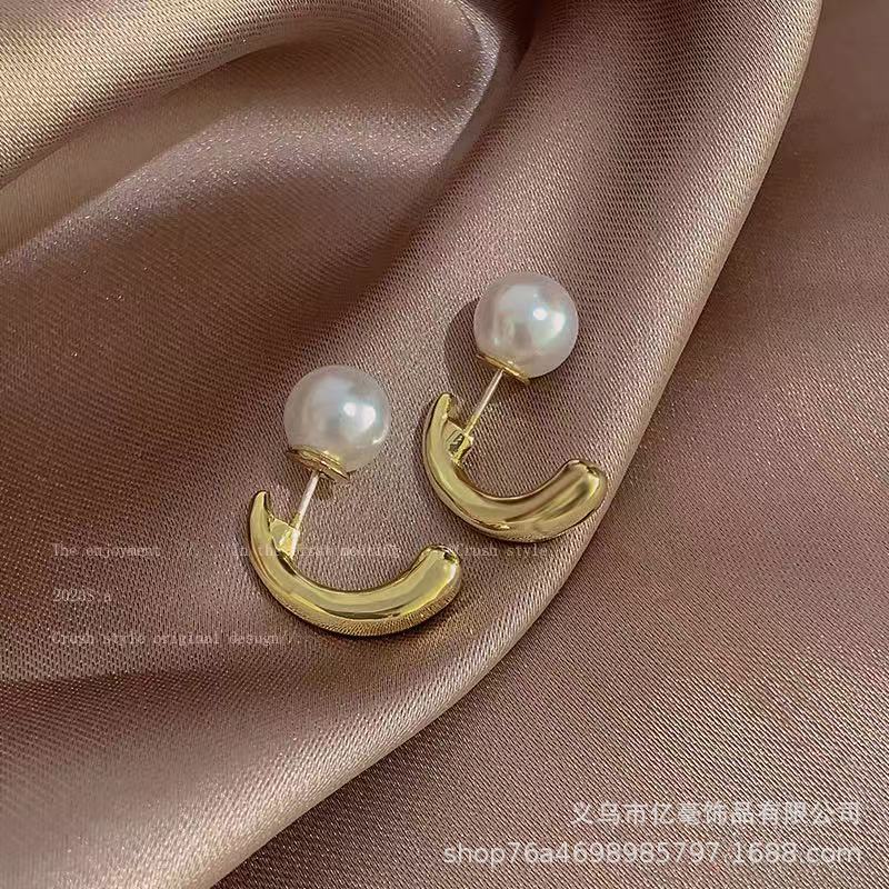 S925 Pendientes de perlas de temperamento Pendientes de lujo ligero de alta gama Pendientes al por mayor y al por menor transfronterizos Mujeres