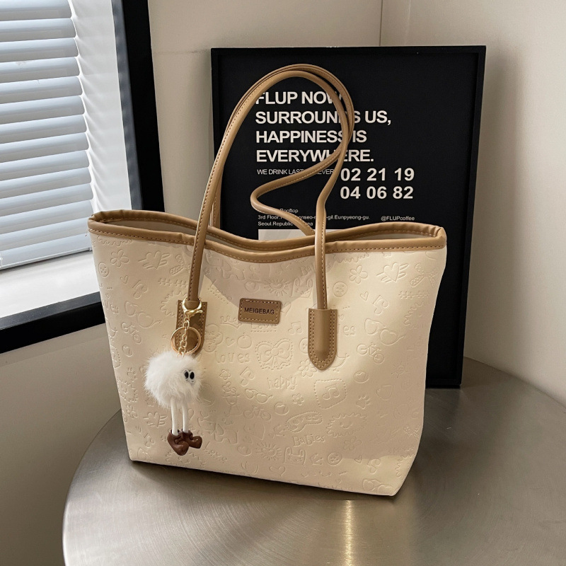 This year's popular large-capacity bag women's 2024 new all-match spring and summer sense portable shoulder bag commuter tote bag This year's popular large-capacity bag women's 2024 new all-match spring and summer sense portable shoulder bag commuter tote bag