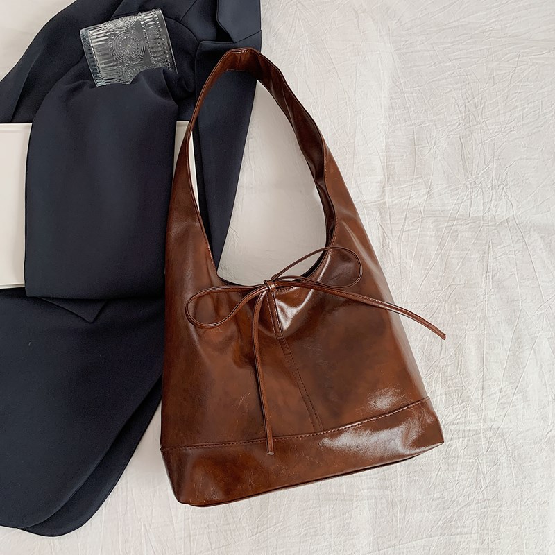 2024 otoño nuevo color sólido popular bolsas de brazo retro empalme bolsas de hombro cordón bolsas de mano bolsas de compras