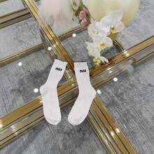 FW0513 25夏季新款女童米杏色字母烫胶中长筒袜