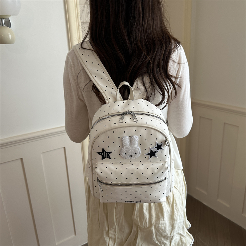 Mochila de estudiantes casuales coreana para mujeres 2026 nueva mochila de nicho de diseño de dibujos animados encantadora personalidad mochila