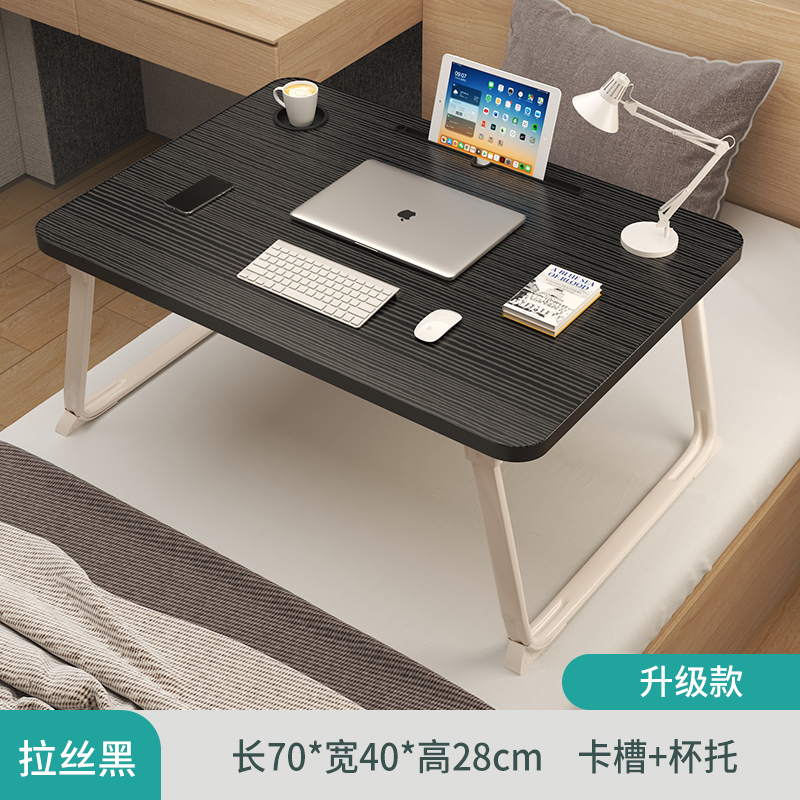 昇降可能な折りたたみ式ベッドの上の小さなテーブルは簡単です。|undefined