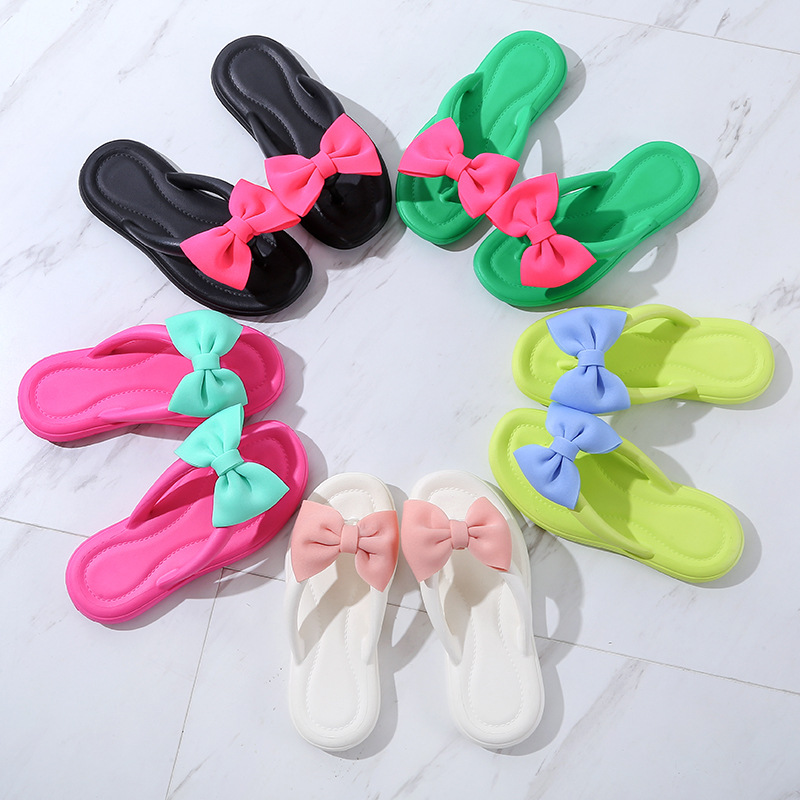 Zapatillas Eva desodorante zapatillas de suela gruesa sensación de caca zapatillas suaves casa playa bowknot flip flops en stock al por mayor