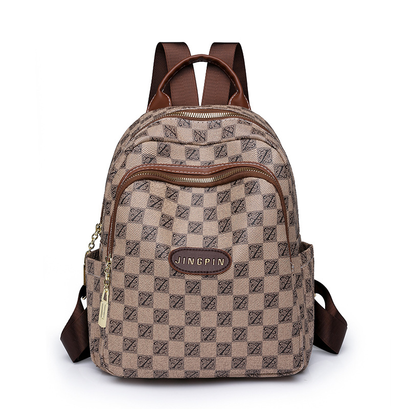 Spot al por mayor 2023 invierno nuevas señoras retro PU mochila de viaje de color de contraste de moda mochila escolar