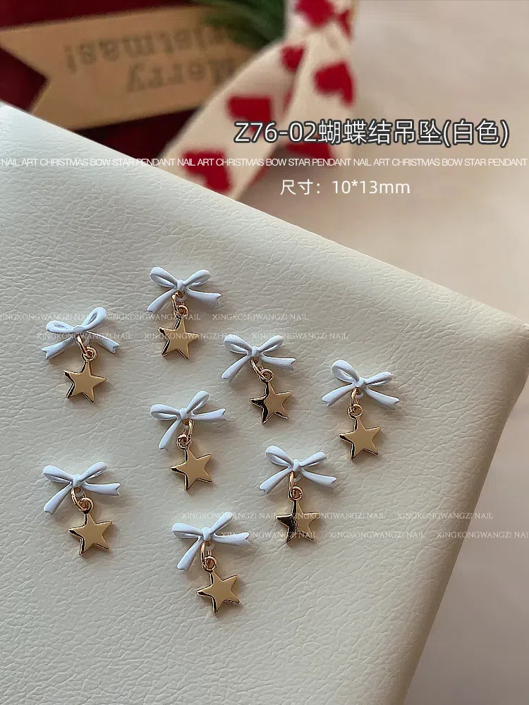 Navidad arco joyas de manicura otoño y invierno nuevo tipo de alta protección de color pentagonal aleación colgante tridimensional accesorios de uñas