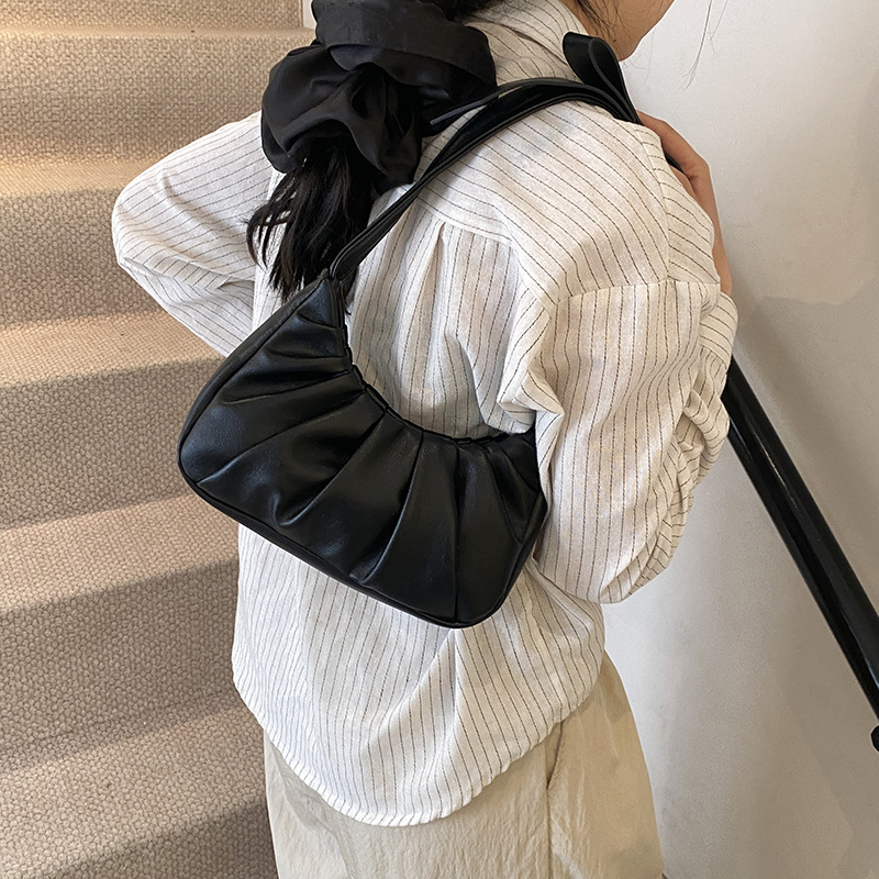 Bolso de axila popular de este año 2025 primavera y verano nuevo bolso femenino lindo bolso de lazo bolso de hombro plisado de moda