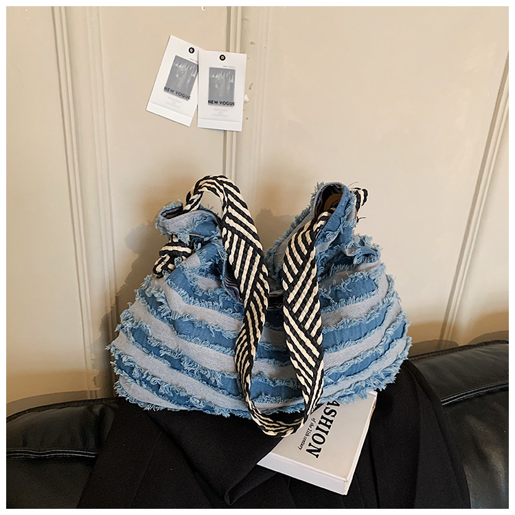 Bolso de denim de gran capacidad para mujeres 2026 verano nuevo estilo retro hacer vieja mochila de hombro de viaje bolsa de ocio