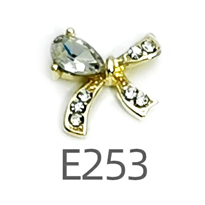 Transfronterizo Japonés arco de uñas accesorios de pajarita caliente simple todo fósforo tridimensional hueco joyería de uñas de diamantes al por mayor