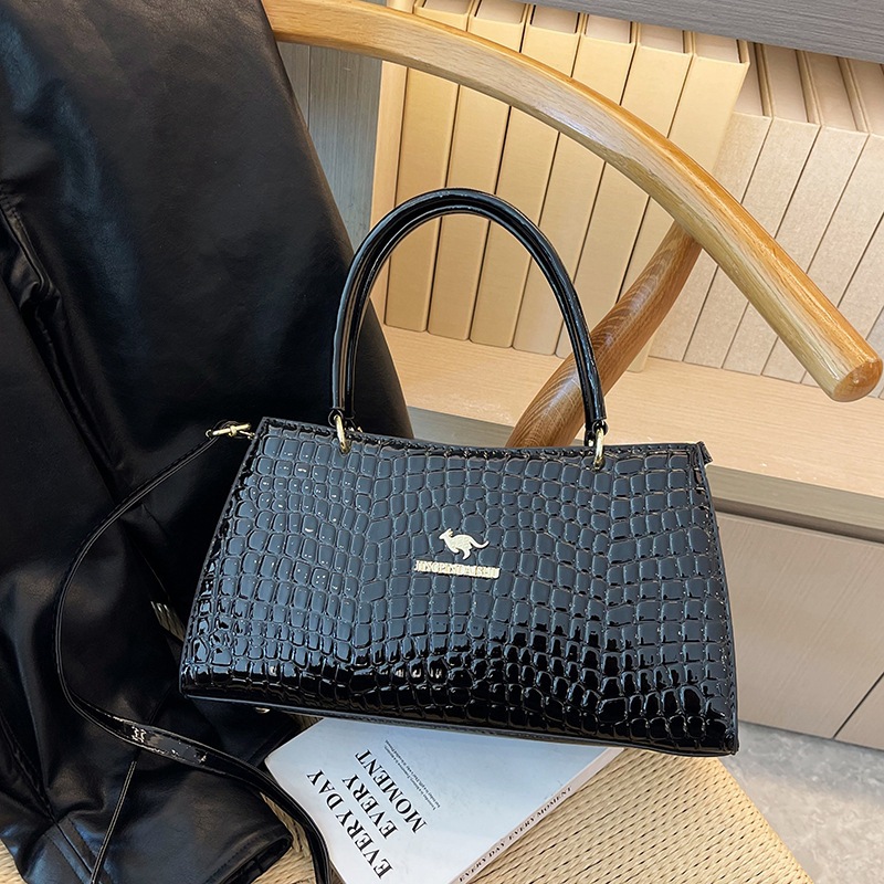 Bolso de gran capacidad 2023 nuevo bolso de mensajero de un solo hombro de moda bolso de patrón de piedra de superficie brillante simple bolso de textura