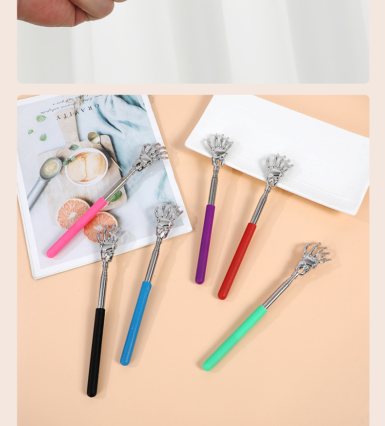 Stainless Steel Extendable Back Scratcher Massage Tool Ghost Hand Design for Home Use in use