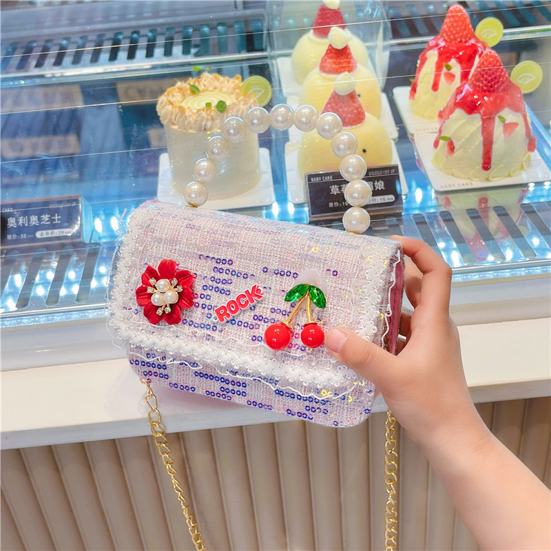 Nuevo bolso de los niños al por mayor Chunxi nuevo arco accesorios bolsa niña fuera monedero crossbody bolsa