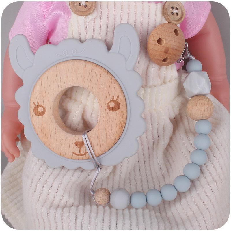 Nuevo bebé suministros de dibujos animados serie Animal anillo de madera mordedor bebé creativo mordedura de goma molar juguete de haya