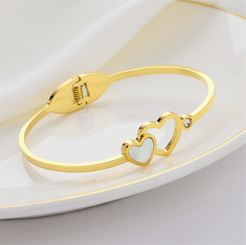 Pulsera de titanio y acero para mujer, diseño moderno y sencillo, pulsera de lujo que no se desvanece, venta al por mayor en stock.