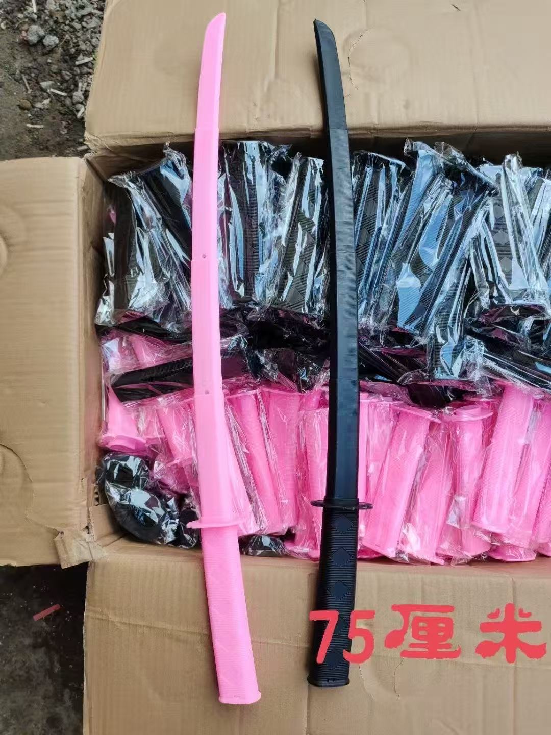Juguetes para niños modelo de automóvil de plástico pistola arco y flecha tarjeta de succión pistola conjunto de anillo 2 yuanes tienda departamental al por mayor