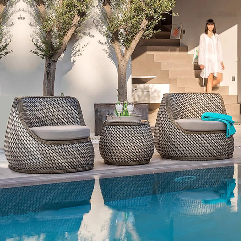 Sofá de patio impermeable y protector solar combinado al aire libre de ocio nórdico al aire libre balcón de caña cama de caña sofá
