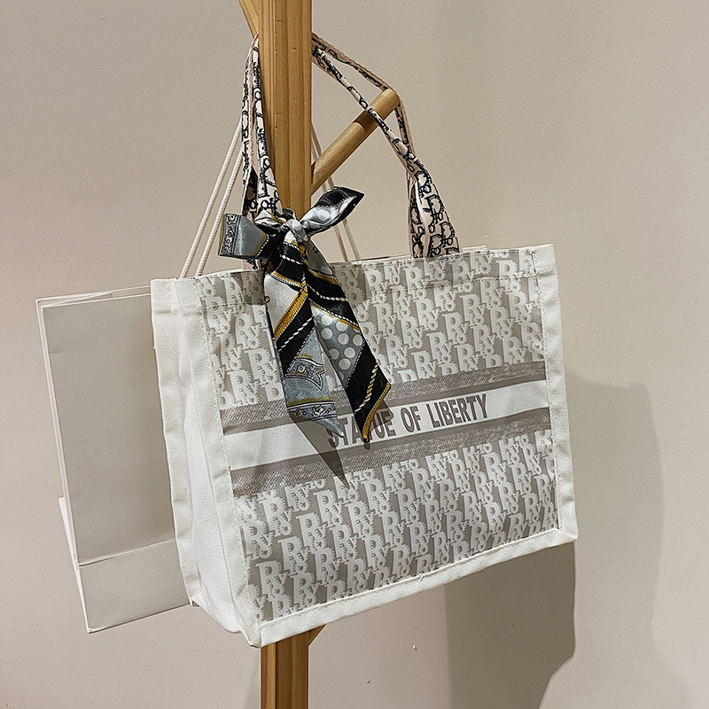 Bolsa de hombro de lona de gran capacidad bufanda de seda casual de mujer nueva moda bolsa de compras estudiante cubo Portátil Bolsa de maquillaje cuadrado