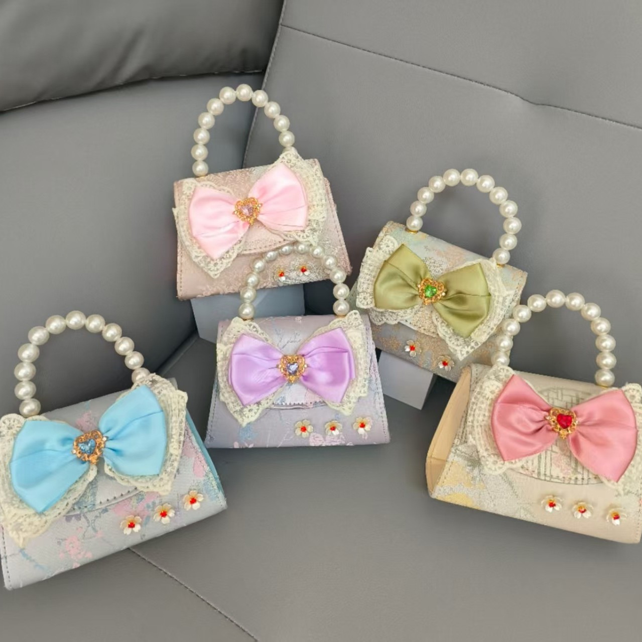 Bolsa portátil de la princesa de perlas estilo nacional arco de hombro bolso de cadena bolso pequeño bolso de cambio de Año Nuevo