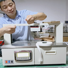自动束带机全自动捆扎机纸带打包机热熔式OPP透明膜带束带机