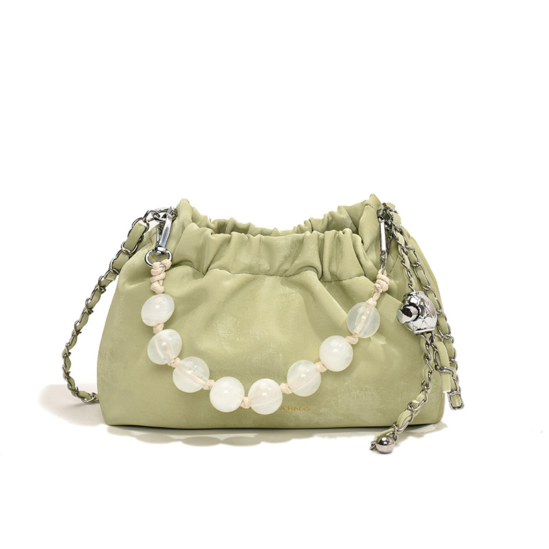 2024 nuevo bolso de perla de moda de mujeres bolso de nube plegado nicho cadena de hombro bolso de cubo